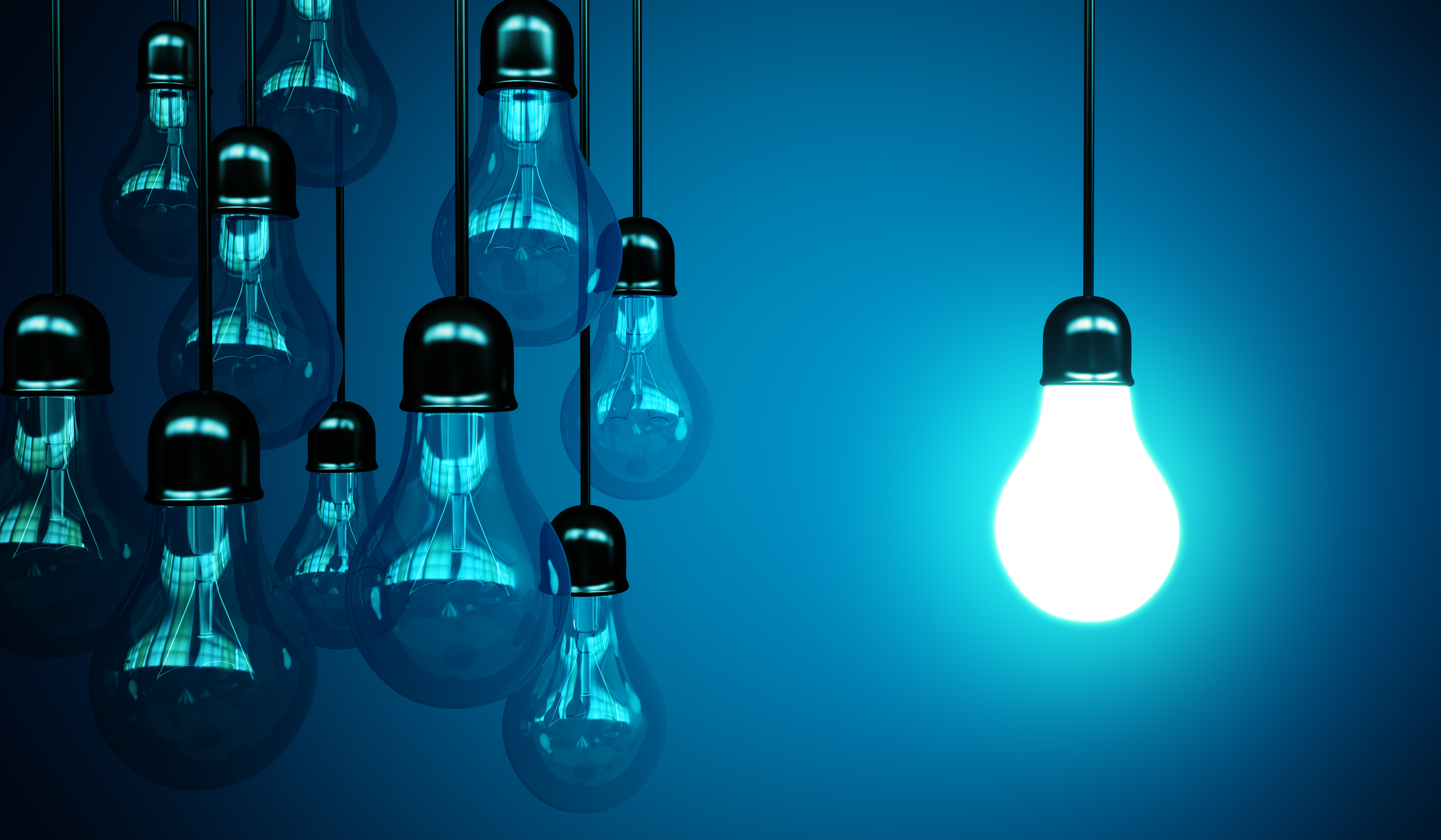 idea concept with light bulbs on a blue background